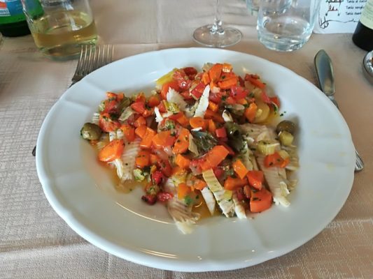 Portata di pesce a Cesenatico